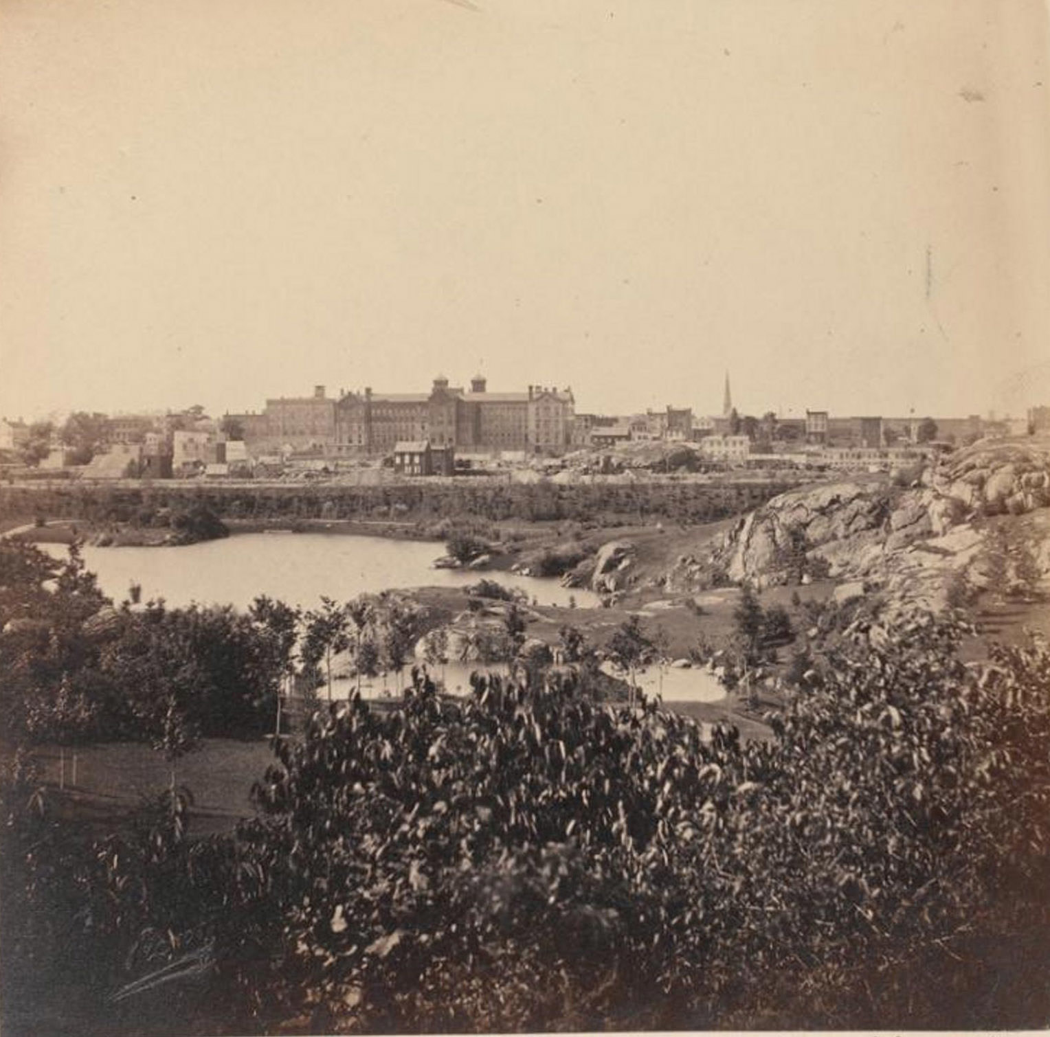 View Of Man-Made Lake With Buildings In Distance, 1862