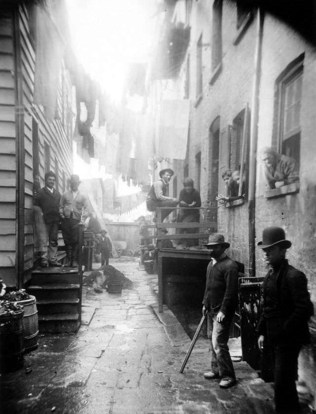 A Group Of Men Loiter In An Alley Off Mulberry Street Known As “Bandits’ Roost.” 1888.