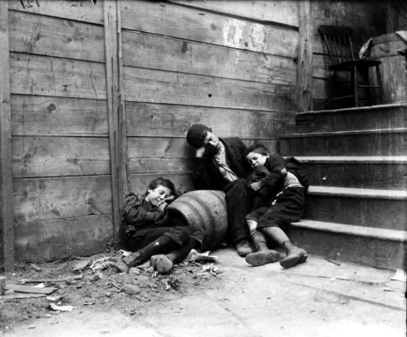 Three Homeless Boys Sleep On A Stairway In A Lower East Side Alley, 1890S.