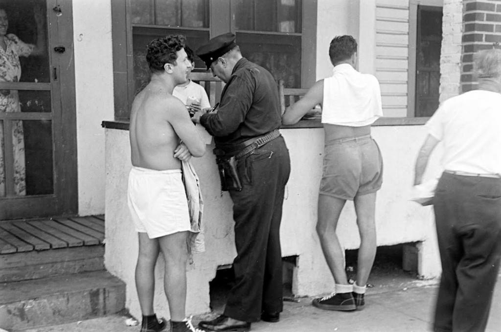 People Being Ticketed For Wearing Bathing Suits And Shorts At Rockaway Beach, 1946