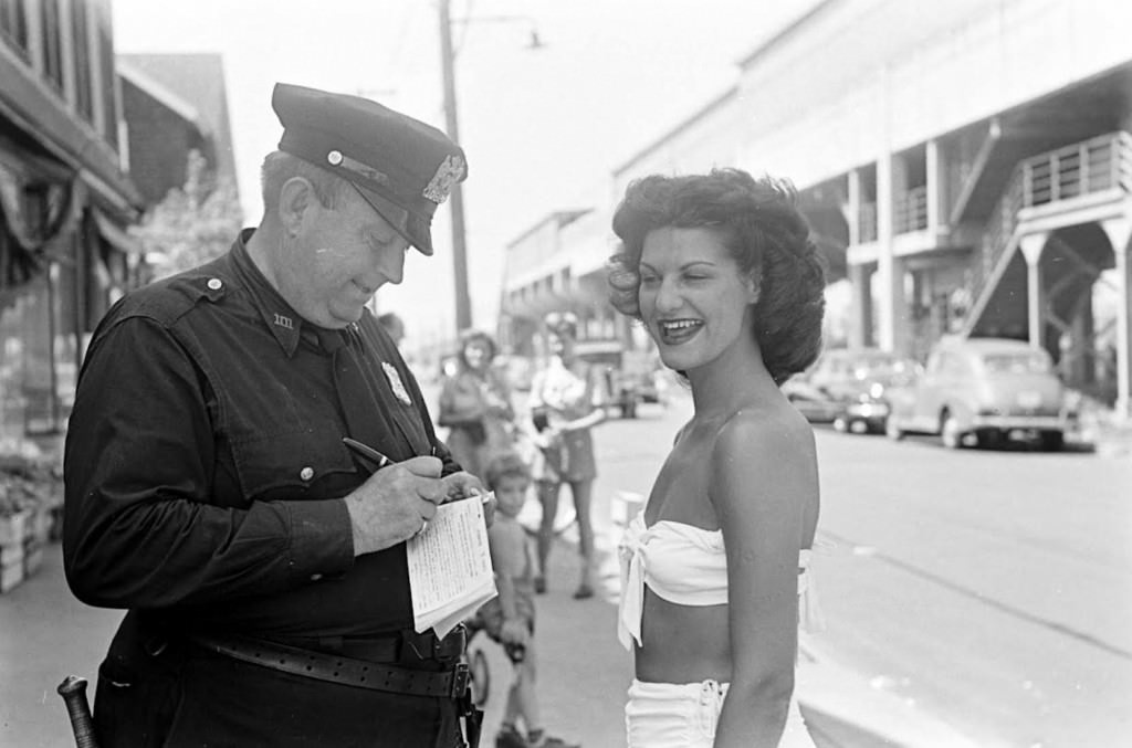 People Being Ticketed For Wearing Bathing Suits And Shorts At Rockaway Beach, 1946