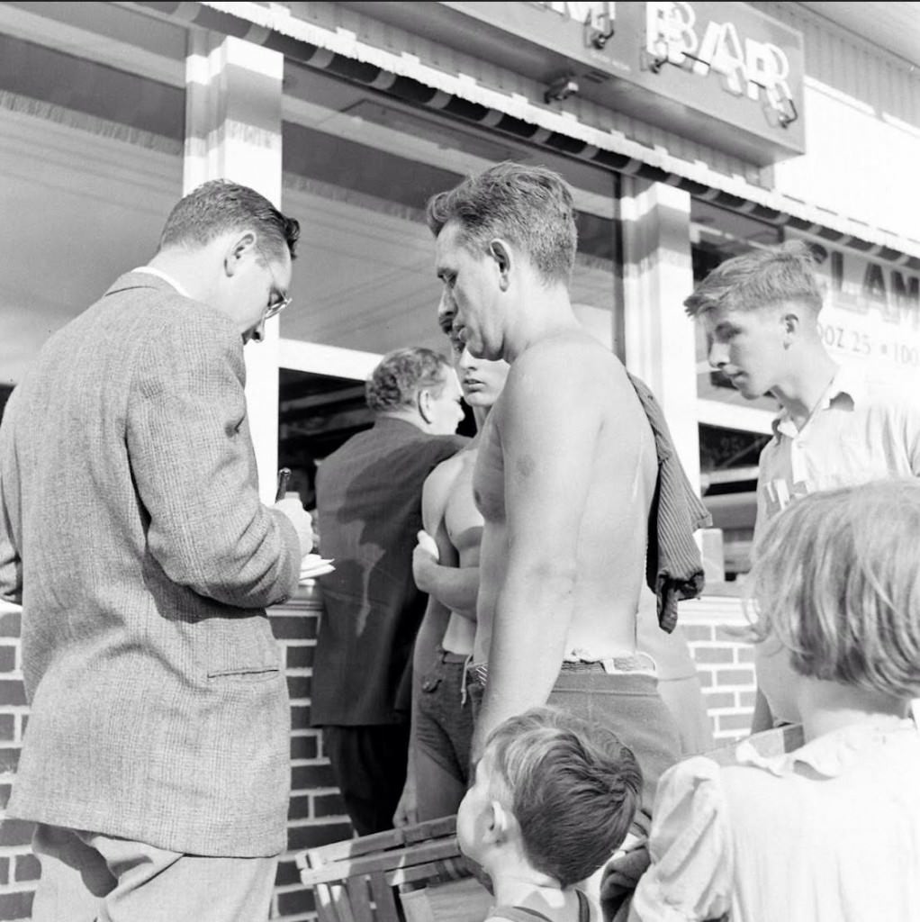 People Being Ticketed For Wearing Bathing Suits And Shorts At Rockaway Beach, 1946