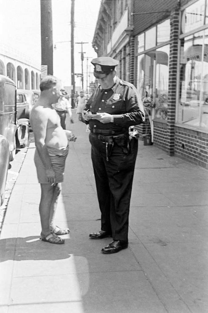 People Being Ticketed For Wearing Bathing Suits And Shorts At Rockaway Beach, 1946