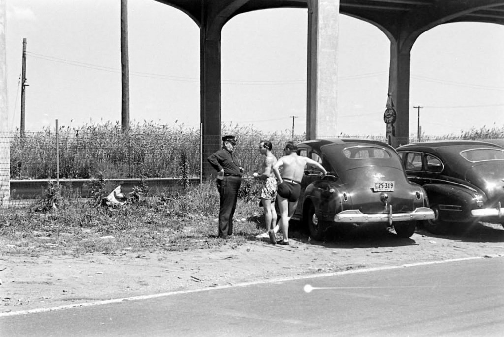 People Being Ticketed For Wearing Bathing Suits And Shorts At Rockaway Beach, 1946