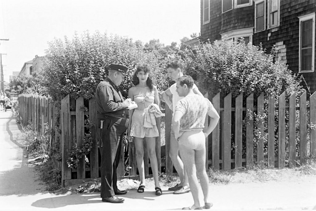 People Being Ticketed For Wearing Bathing Suits And Shorts At Rockaway Beach, 1946