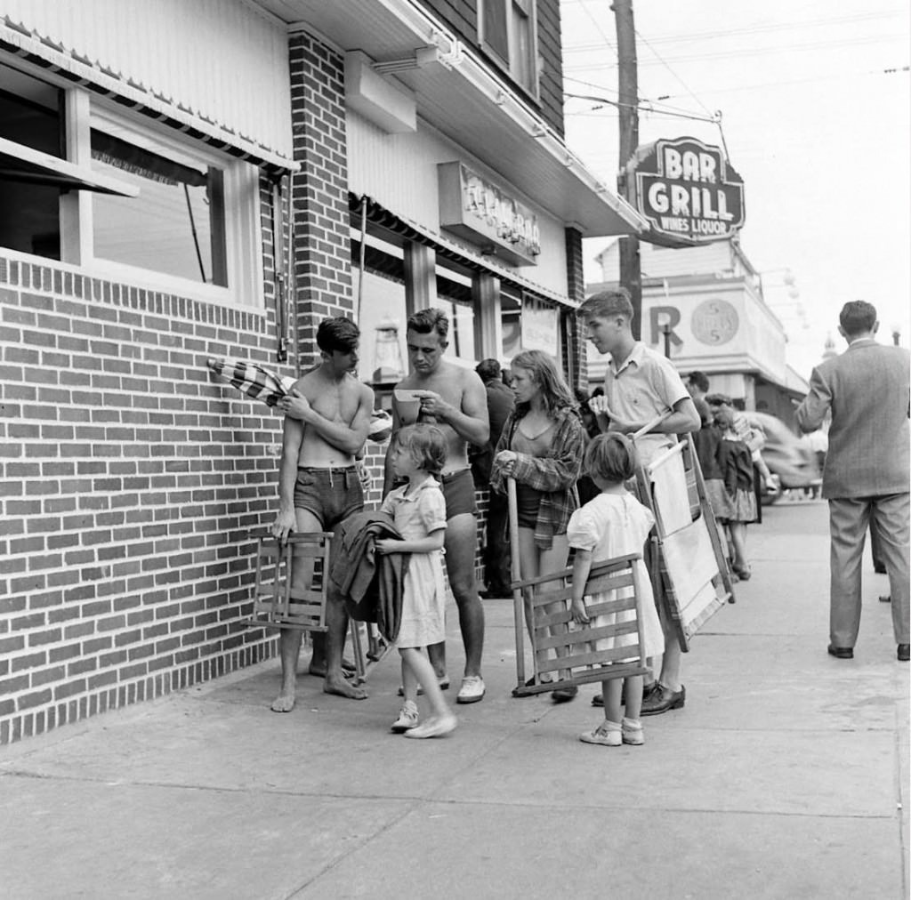 People Being Ticketed For Wearing Bathing Suits And Shorts At Rockaway Beach, 1946