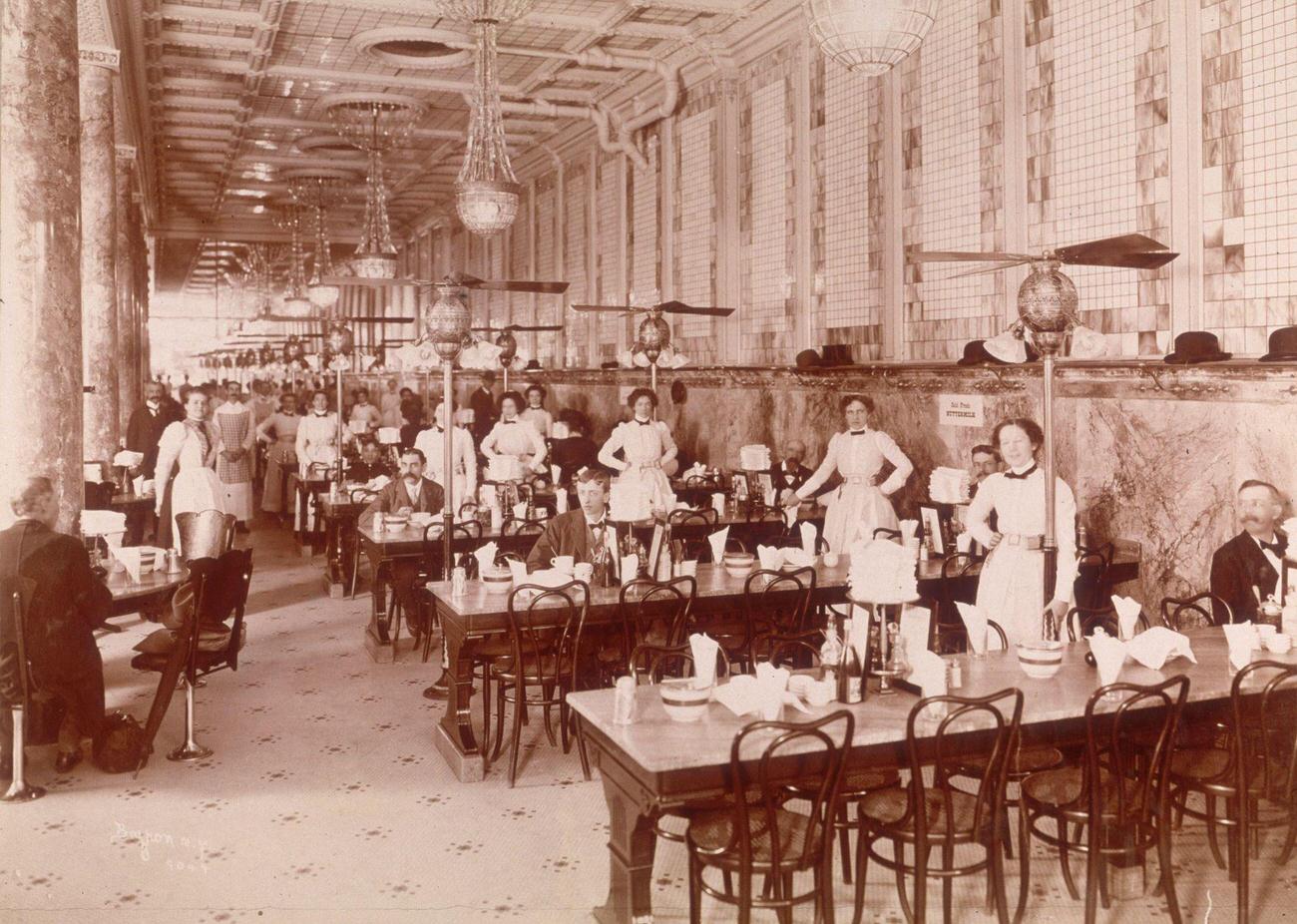 Waitresses Standing Near Tables Where Male Patrons Eat At A Childs Unique Diary Lunch Room, Possibly The Location At 47 East 42Nd Street, New York City.