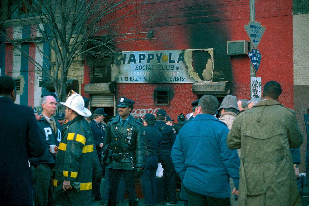 Police And Fire Officials Mill About The Happy Land Social Club In The Bronx Early 3/25 Following A Fire That Killed At Least 87 People Inside Mostly From Smoke Inhalation. The Club Reportedly Had No Windows.