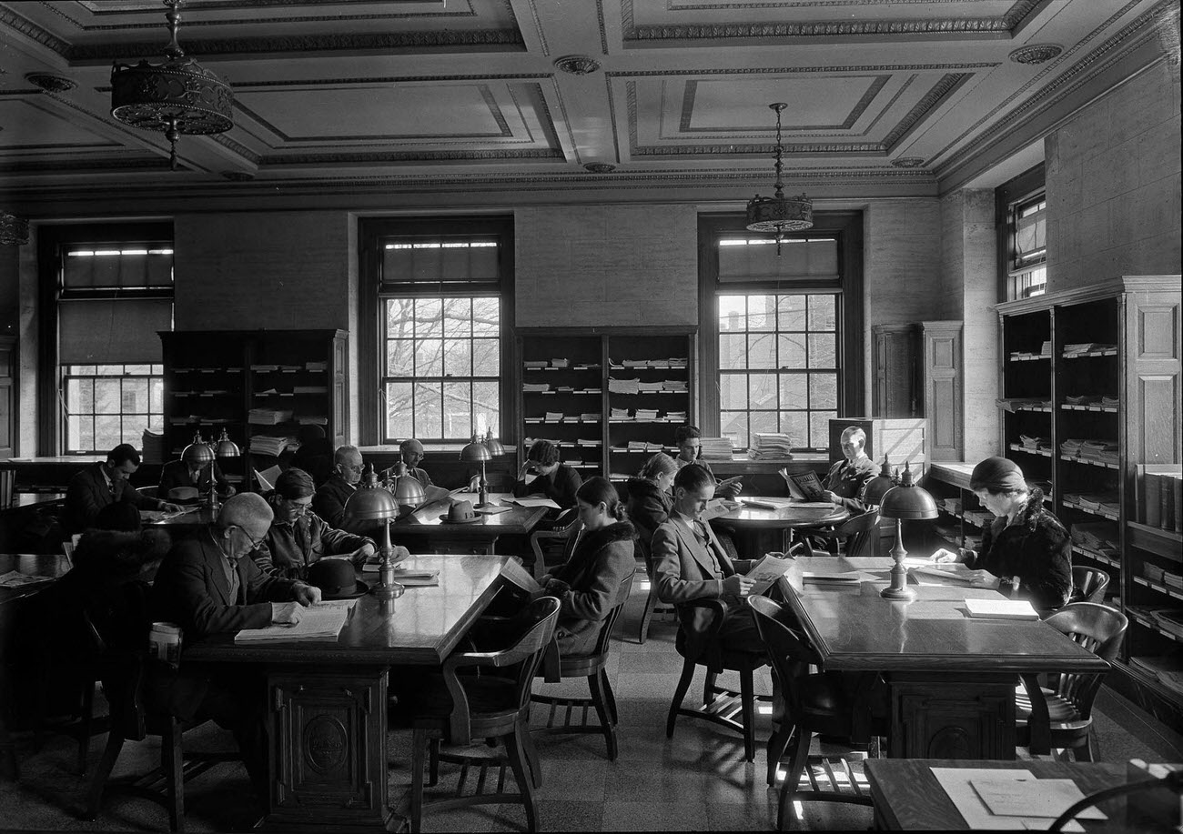 Unemployed readers in periodical room.