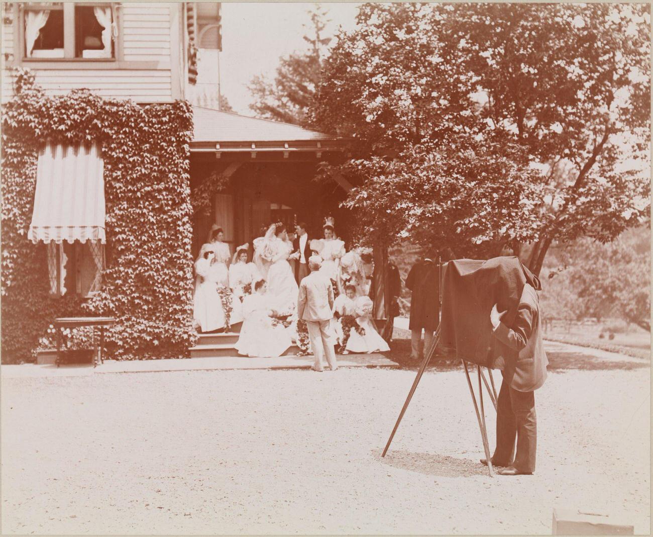 A Photographer Waits As A Bridal Party Arranges Themselves For A Wedding Portrait On The Steps Of A Staten Island Home, June 1, 1895. At The Wedding, Anne Flemming Cameron Married Belmont Tiffany.