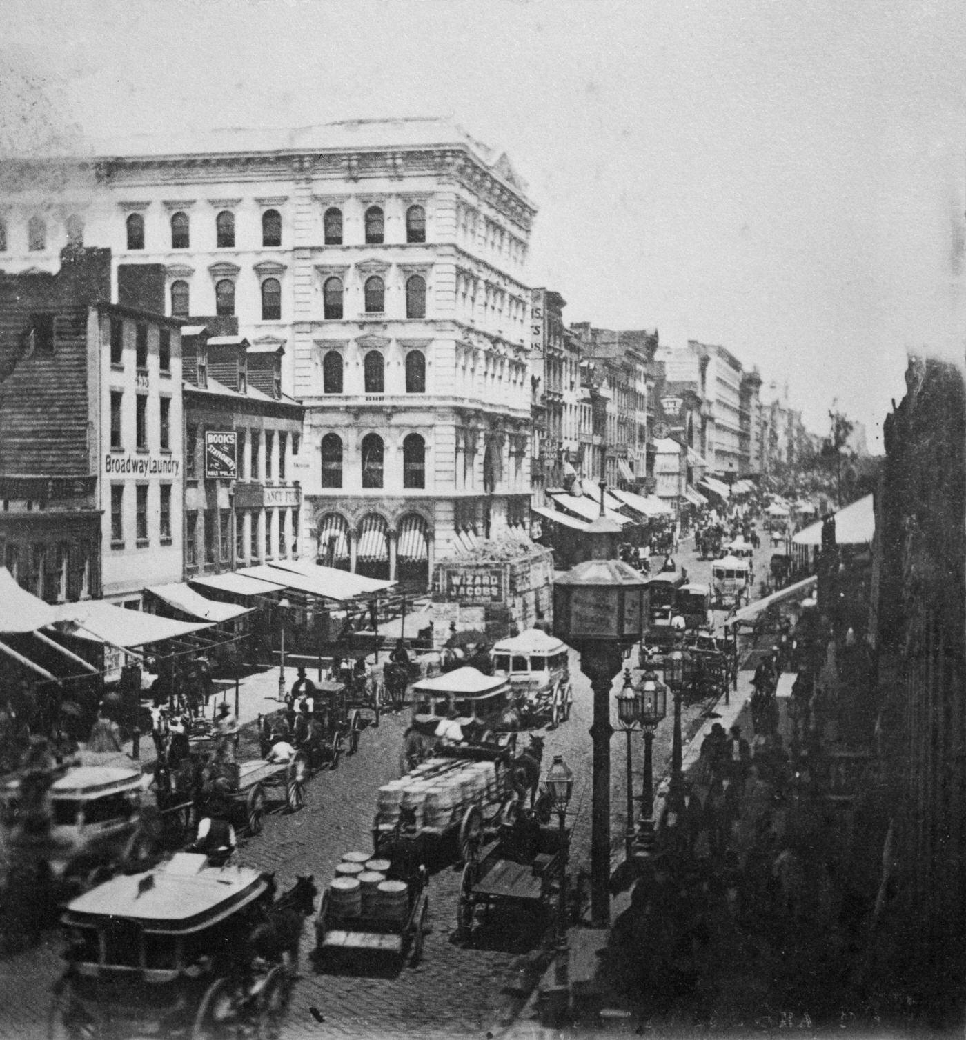 High-Angle View Of Horse-Drawn Traffic On Broadway Near Grand Street, New York City, 1885