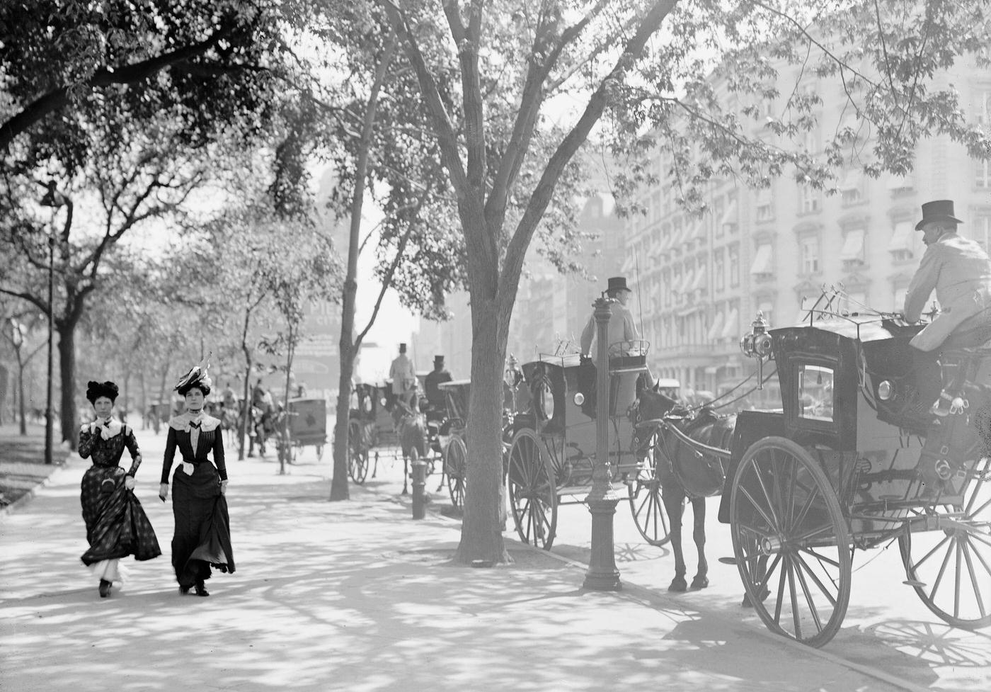 Two Women Strolling Near Cab Stand, Madison Square, New York City, 1900