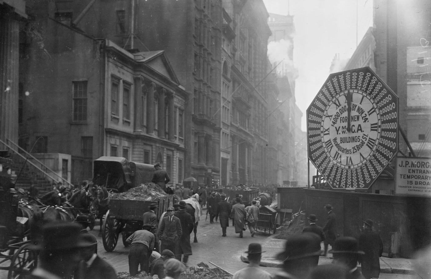 Wagons on Manhattan Streets by YMCA Clock Sign, New York City, circa 1900