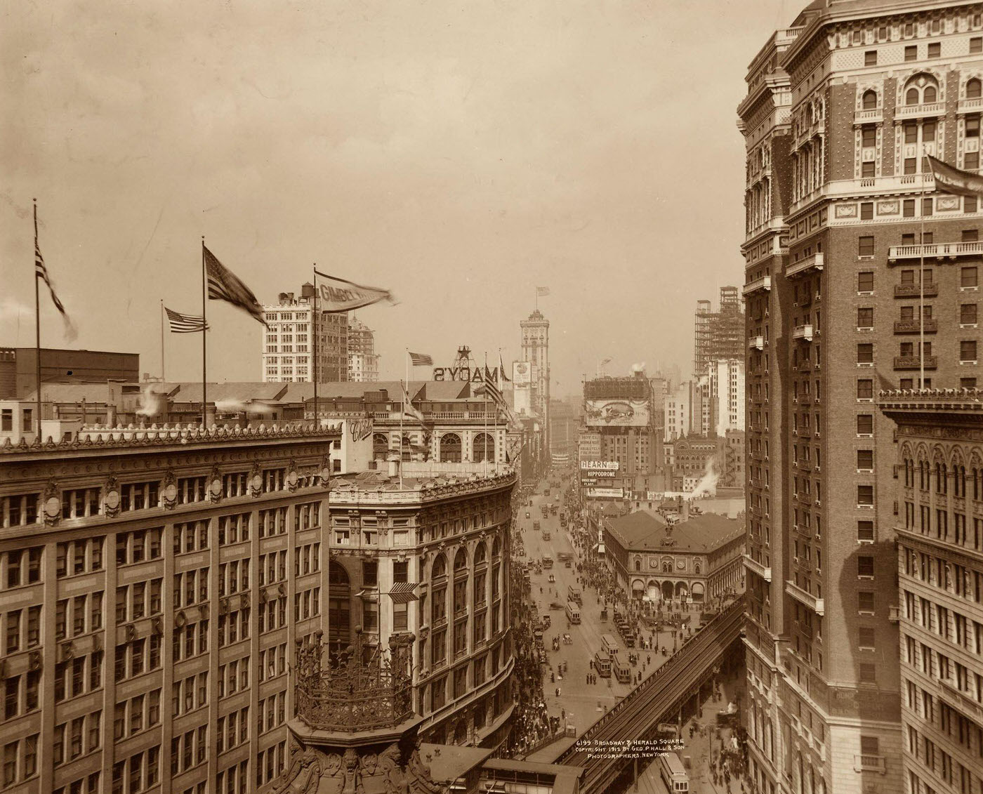 Broadway &Amp;Amp; Herald Square: View Along Broadway Passing Herald Square, Elevated Train Track Above Avenue Of The Americas With Visible Structures Including Gimbels And Macy'S Department Stores, Notel Normandie, Hippodrome, Times Tower, New York City, 1912