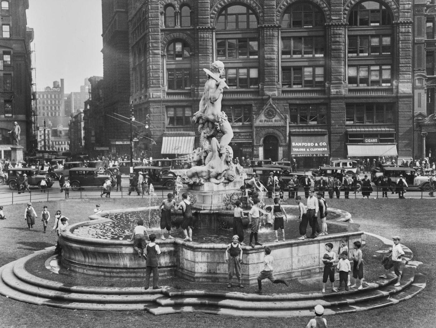 Children Playing At 'Civic Virtue Triumphant Over Unrighteousness', Angelina Crane Fountain Outside City Hall, Manhattan, Circa 1925.