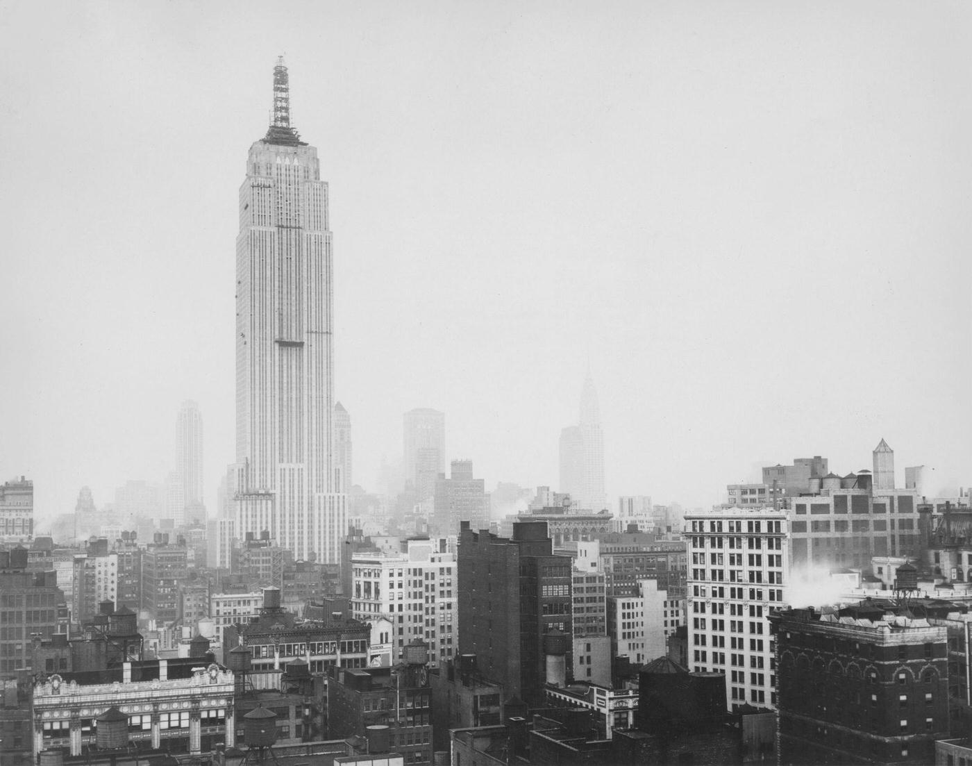 Empire State Building Under Construction, Including Chrysler Building, Manhattan, 1929.