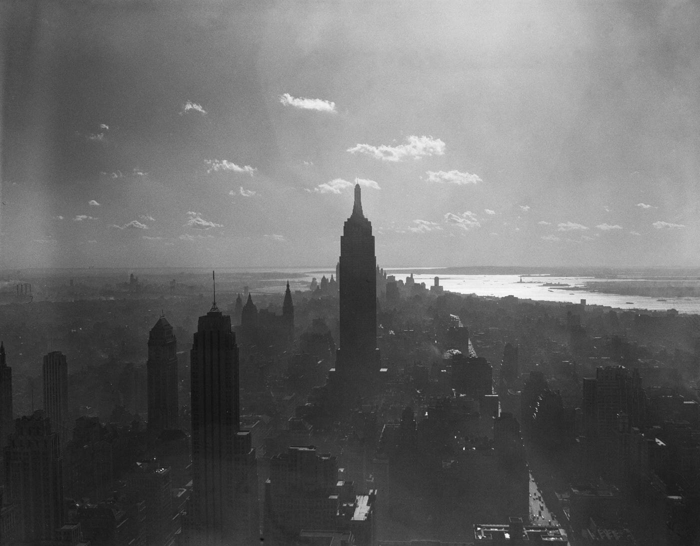 Empire State Building, View Looking South As The Sun Sets Over Midtown Manhattan, Manhattan, 1935.