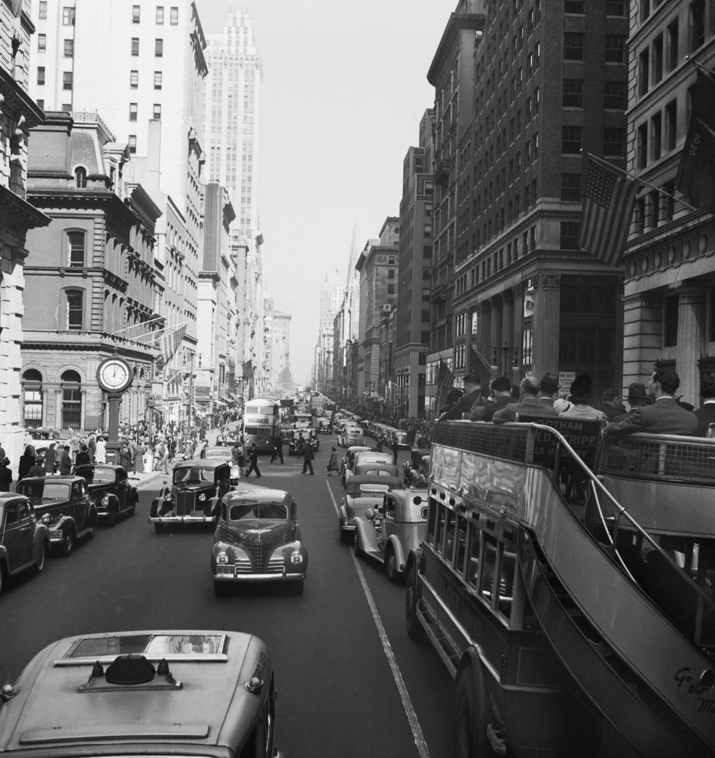 Traffic and a Tour Bus on Fifth Avenue, Manhattan, 1935.