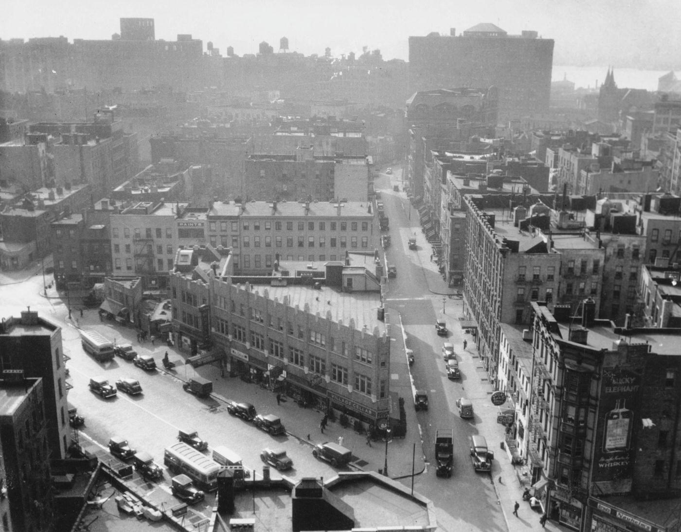 High Angle View Looking West in Greenwich Village, Intersection of Grove Street and Seventh Avenue South, Manhattan, 1936.