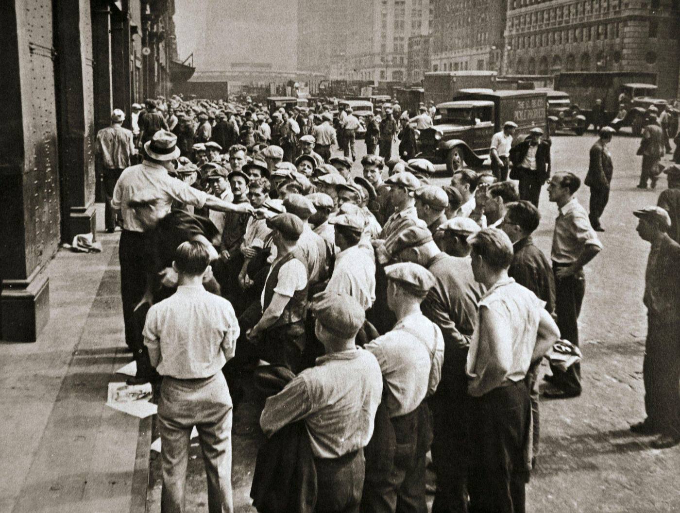 Longshoremen Being Picked Out by a Boss, Along West Street on the Hudson River, Manhattan, 1930s