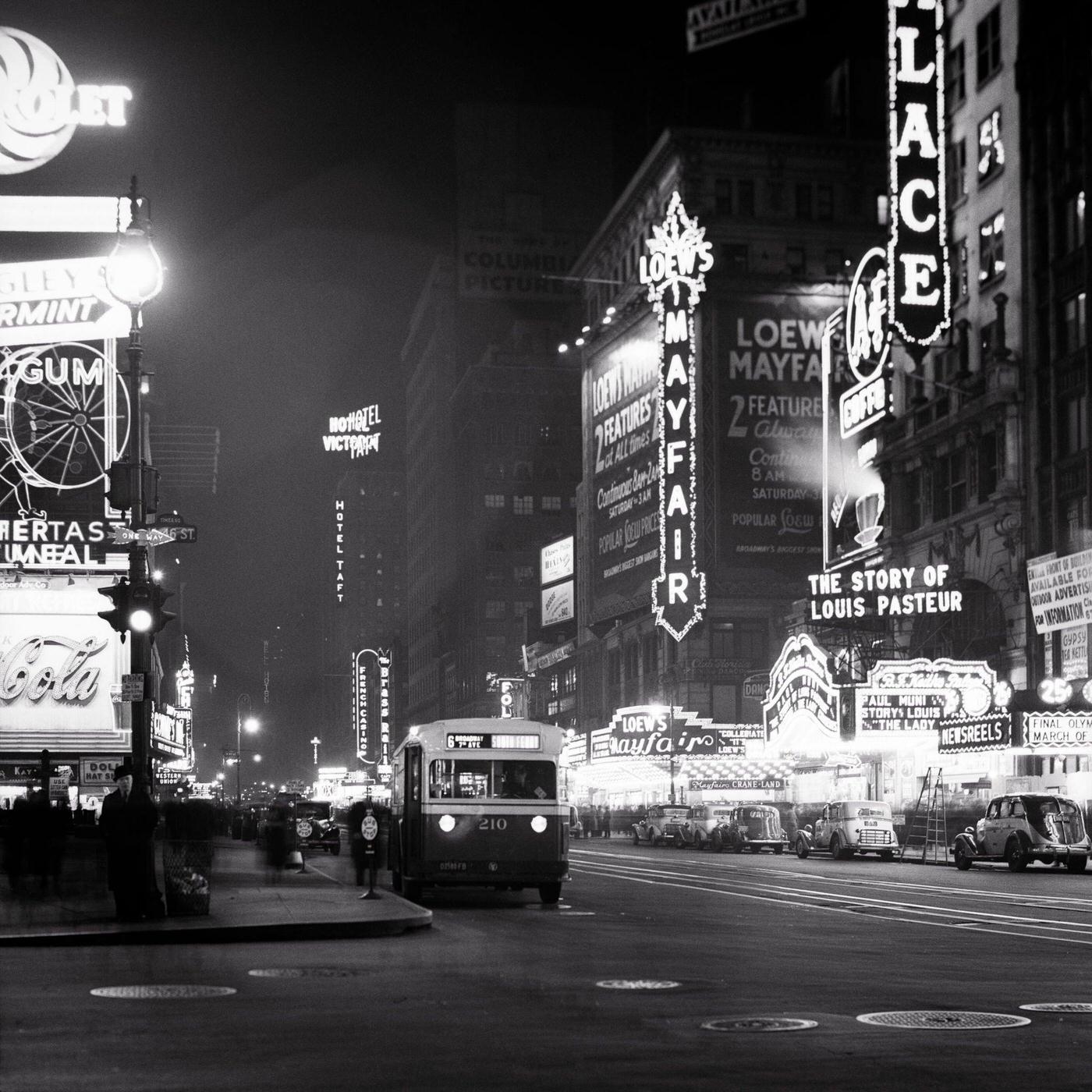 Times Square 46th Street Night Bus Coming Down Broadway Bright Lights, Manhattan, 1936.