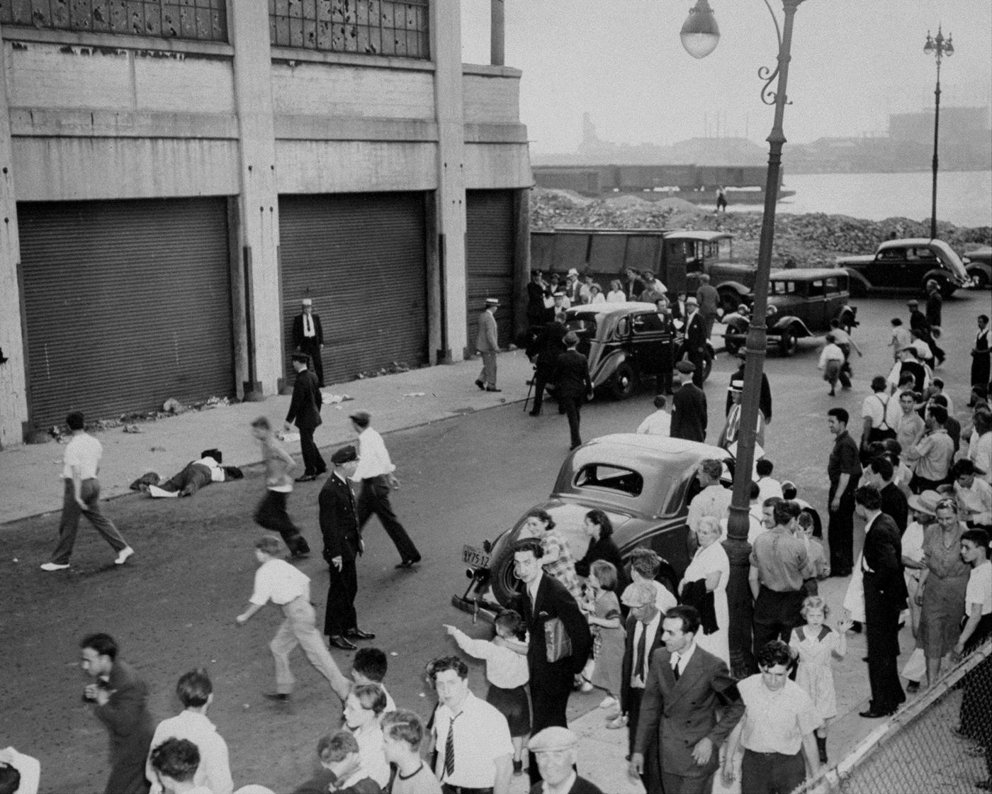 Crowd Gathers Around The Body Of John Masseria As Police Arrive At The Murder Scene On 19Th St. In New York City, Manhattan, 1930