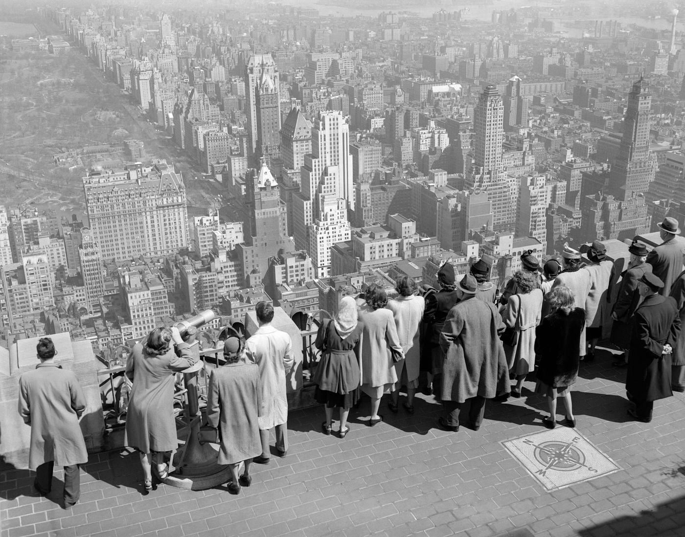 Group Of Anonymous Tourists Standing On Top Of Rca Building Looking North Towards Central Park, Manhattan, 1940S