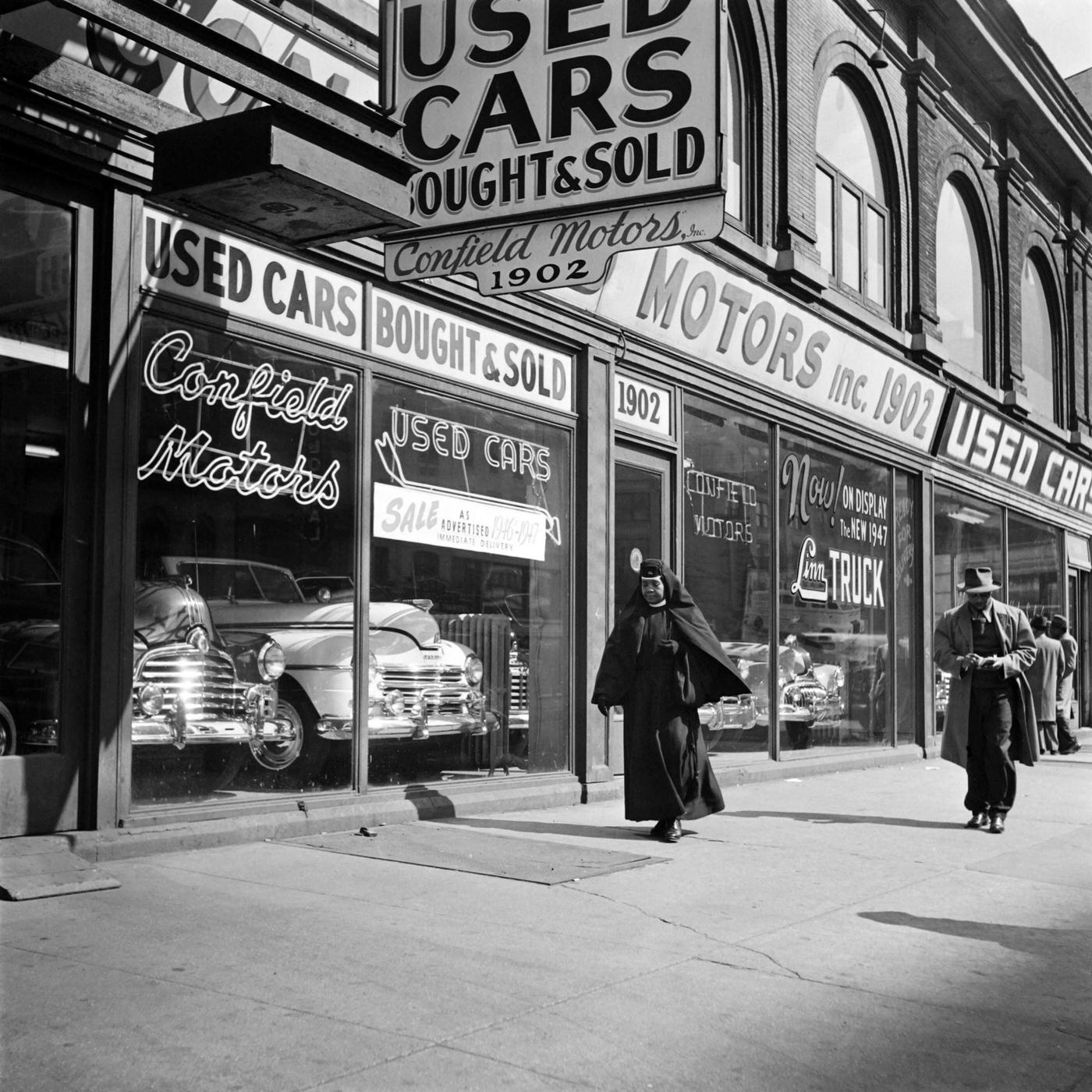 Afro-American Nun Walks On Broadway In The Used Car Dealership District, North Manhattan, 1947