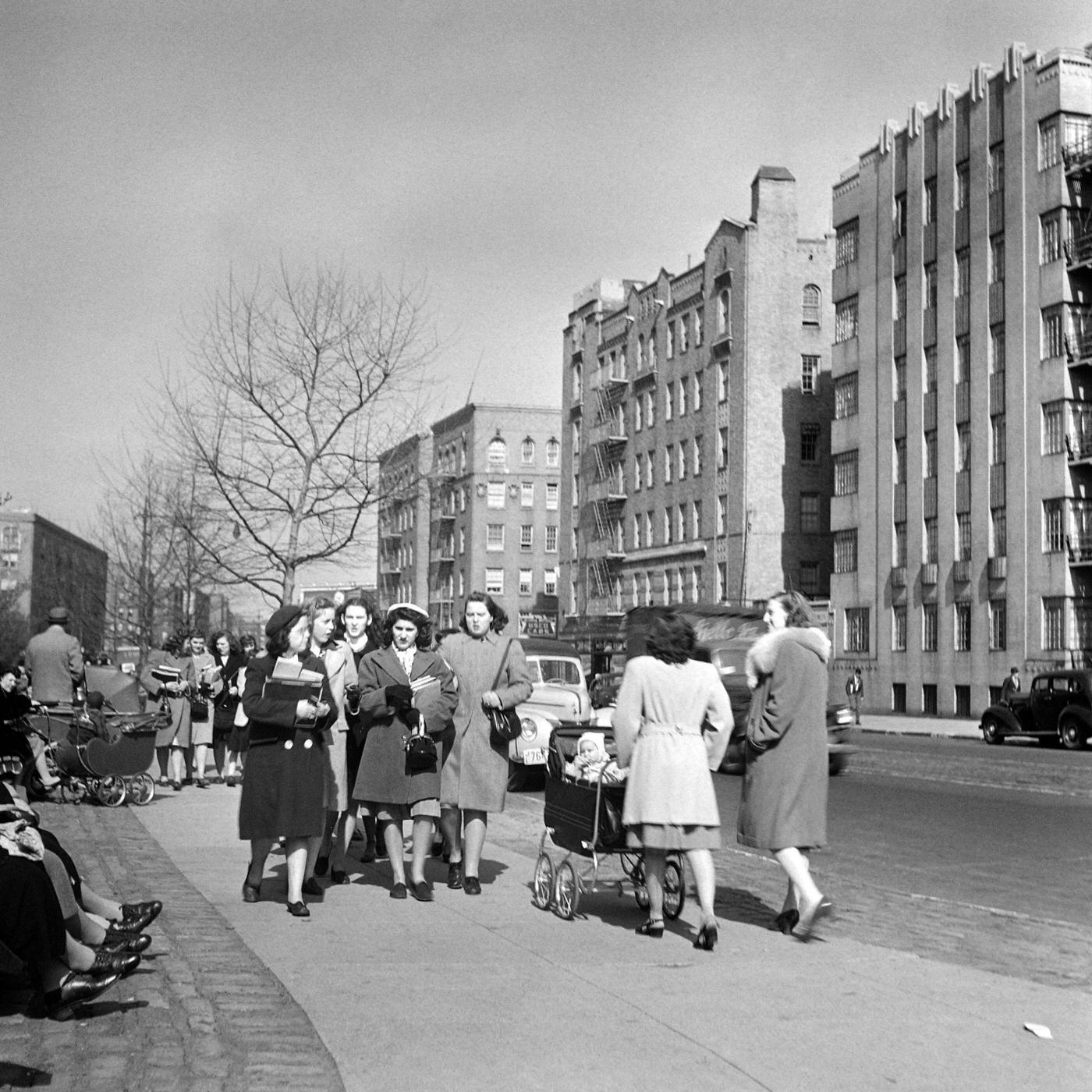 Women With A Baby Carriage Meet Students On A Sidewalk Of Broadway, Manhattan, 1947