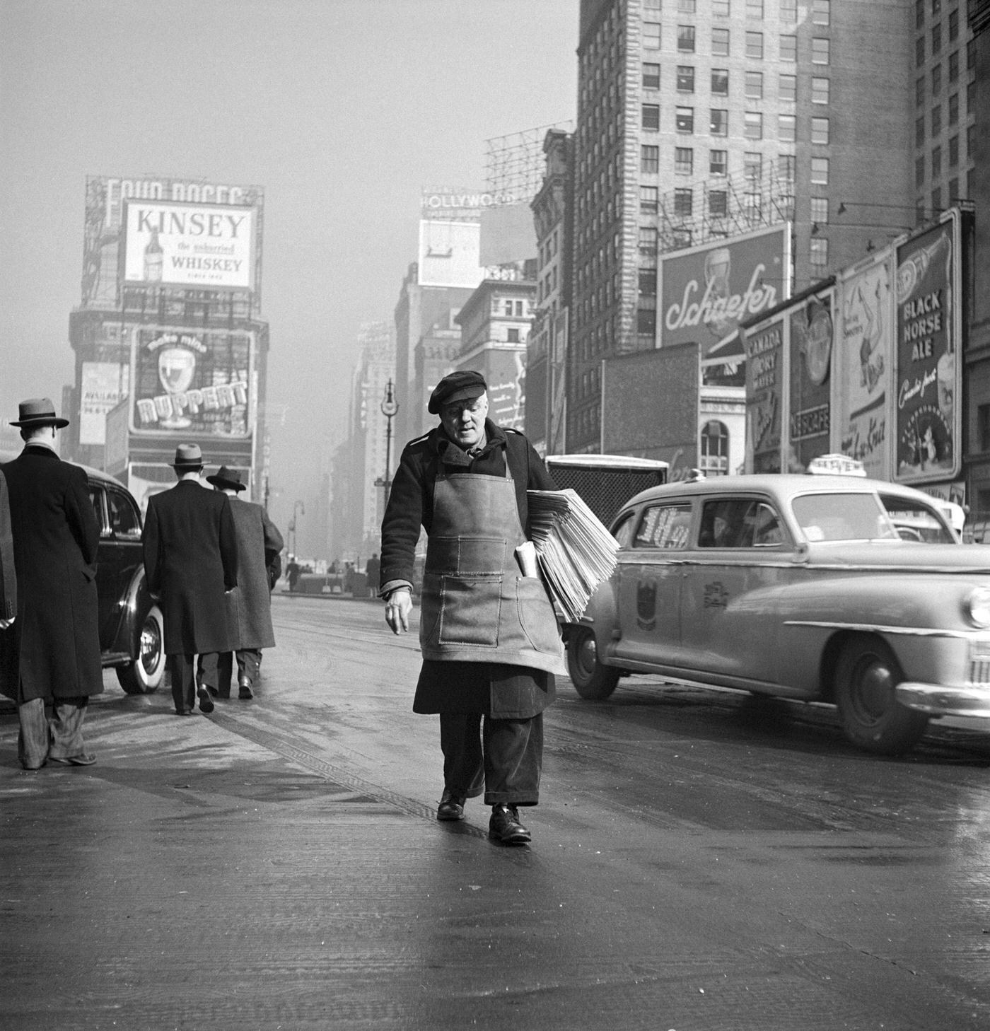 Delivery Man Carries Newspapers On Broadway, Manhattan, 1947