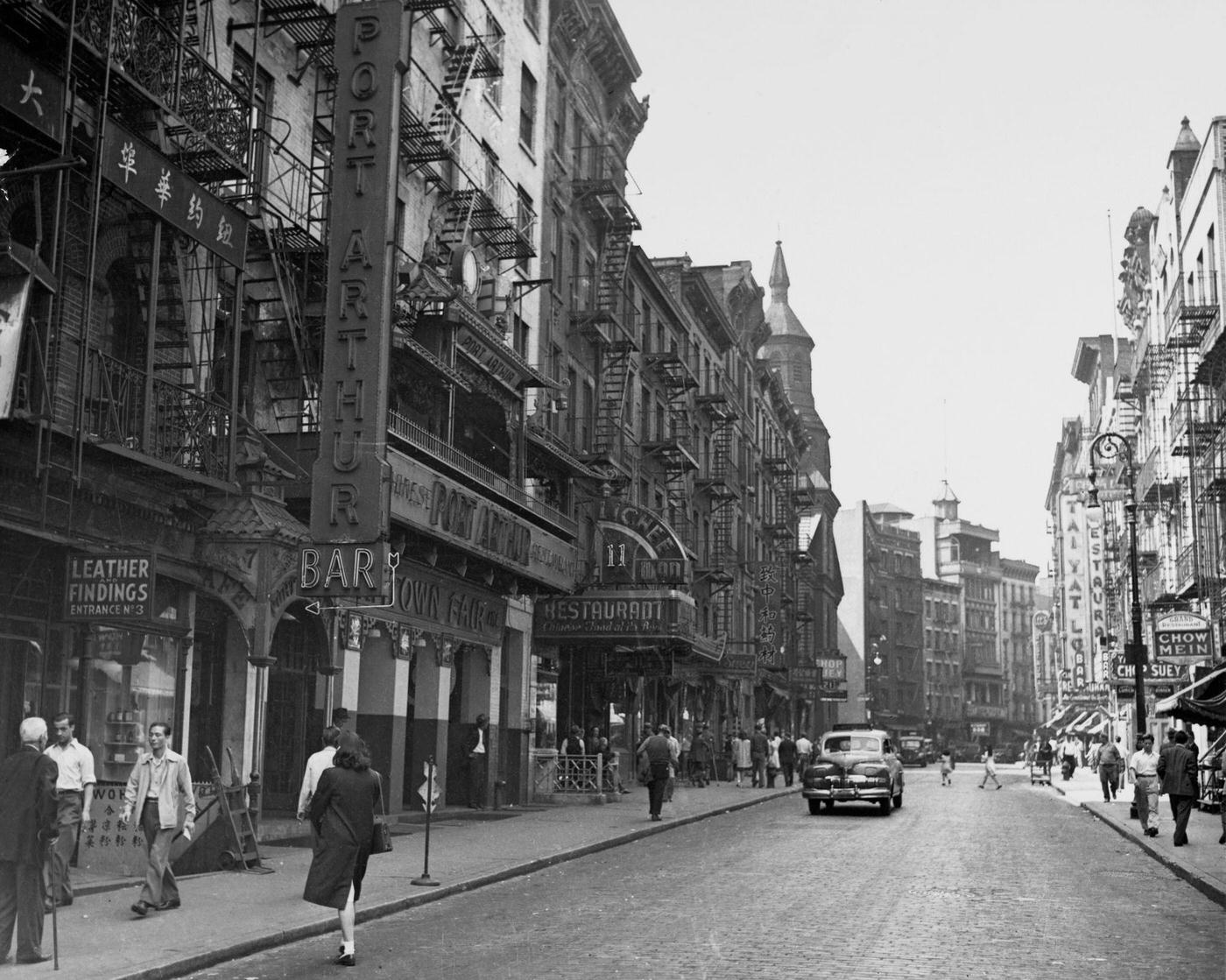 View Of Mott Street Past The Port Arthur Restaurant In Chinatown, Lower Manhattan, 1943