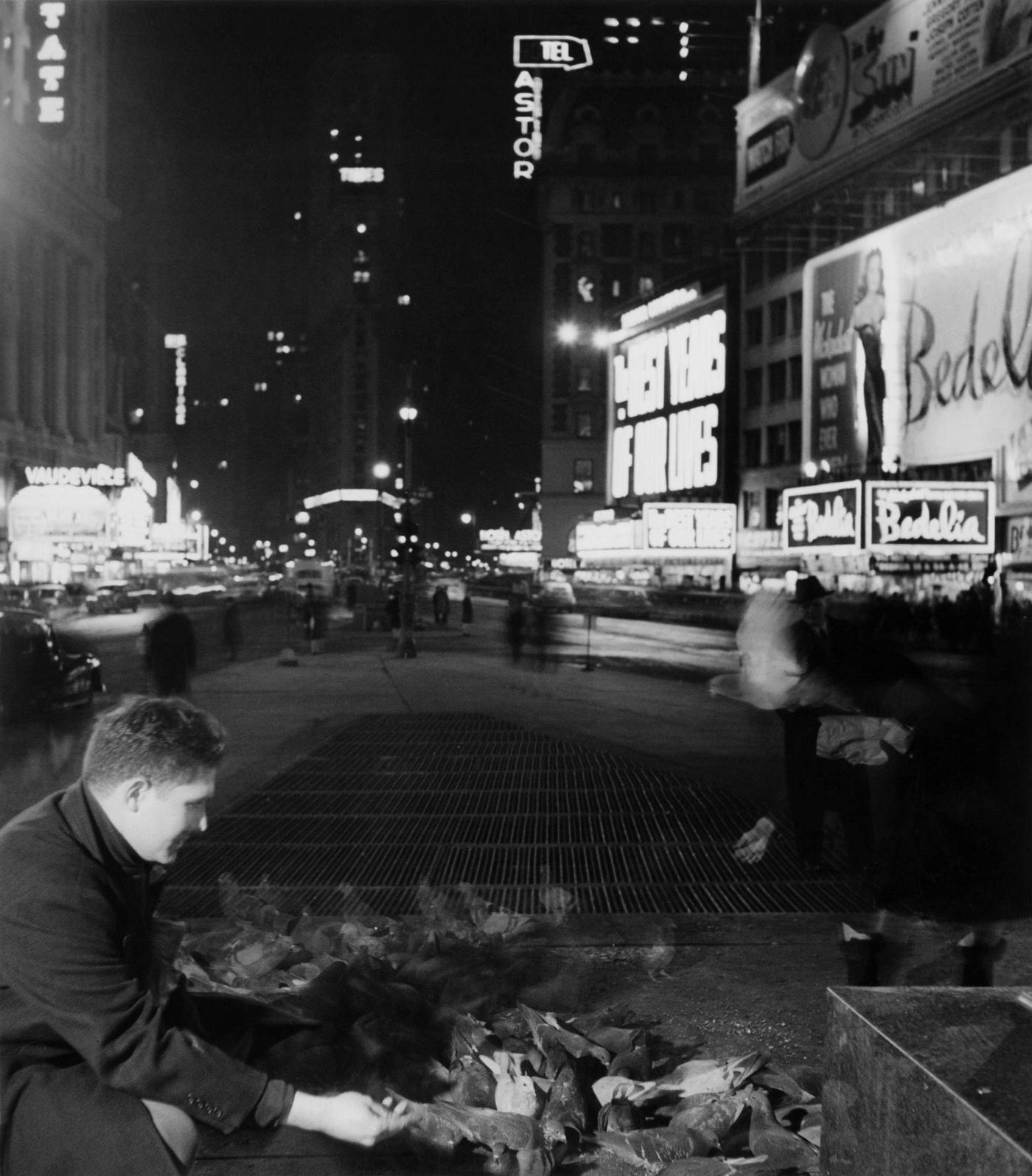 Man Feeding Pigeons In Times Square, Manhattan, 1946