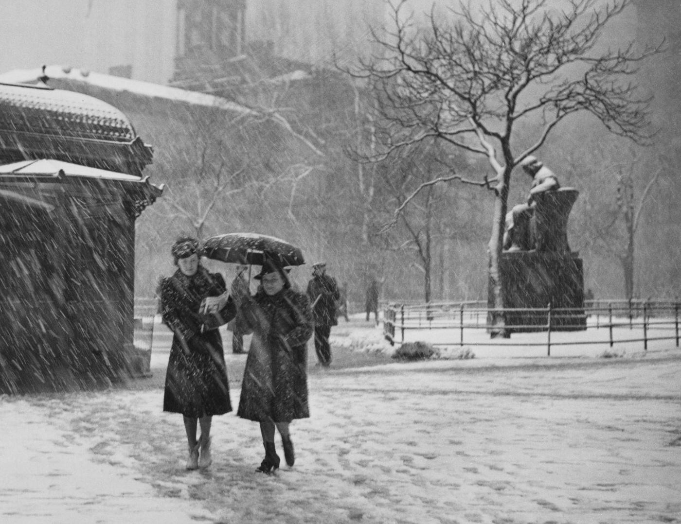 Pedestrians Sheltering From Snow And Freezing Rain In Herald Square, Manhattan, March 1940
