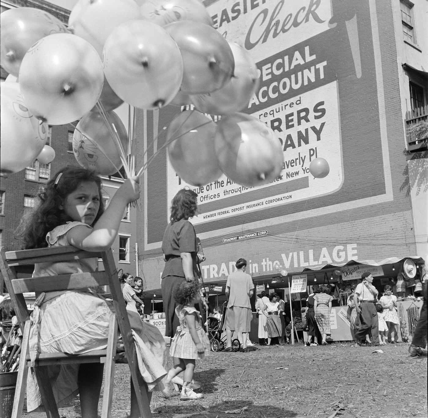 Little Girl Holds Balloons At A Local Greenwich Village Farmers Market, Manhattan, 1947.