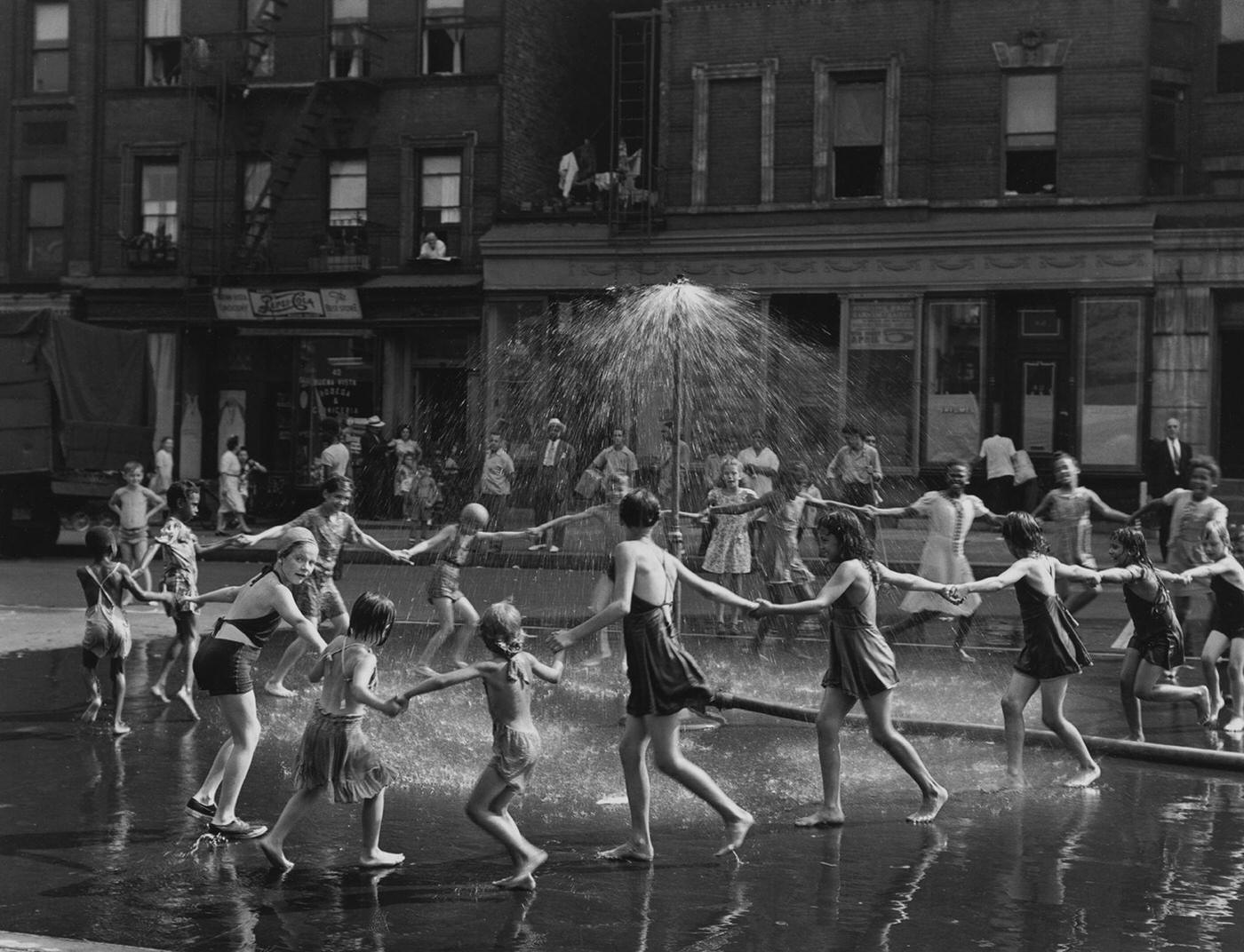 Children Playing In A Harlem Sprinkler, Manhattan, 1946