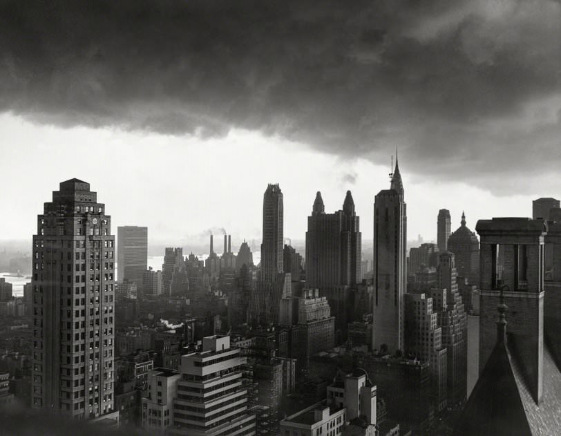 Storm Over Manhattan, New York City, 1950. The Towering Buildings Of Manhattan Are Silhouetted Against Heavy Clouds Which Gathered Over The City Just Before A Sudden Electrical Rainstorm.