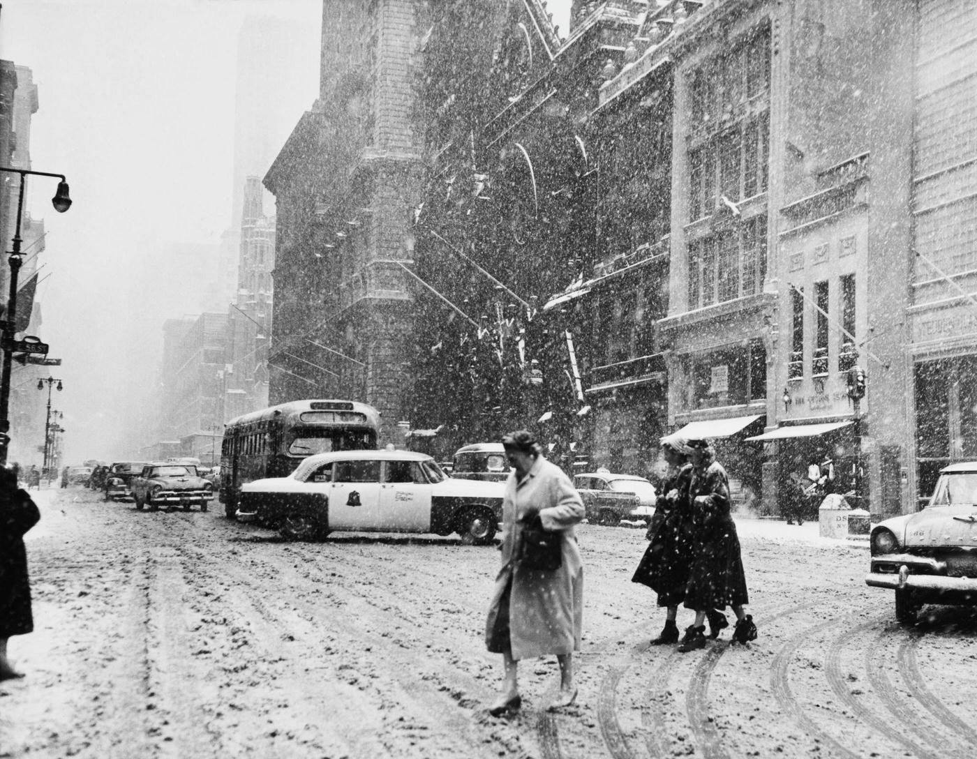 Blizzard Hits Manhattan: Pedestrians Navigate Fifth Avenue At 57Th Street In A Blizzard, Manhattan, 1957.
