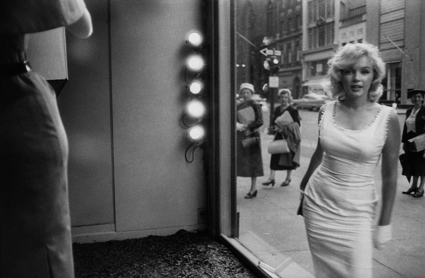 Marilyn Monroe Seen Through Window Of Department Store On Fifth Avenue, Manhattan, 1957