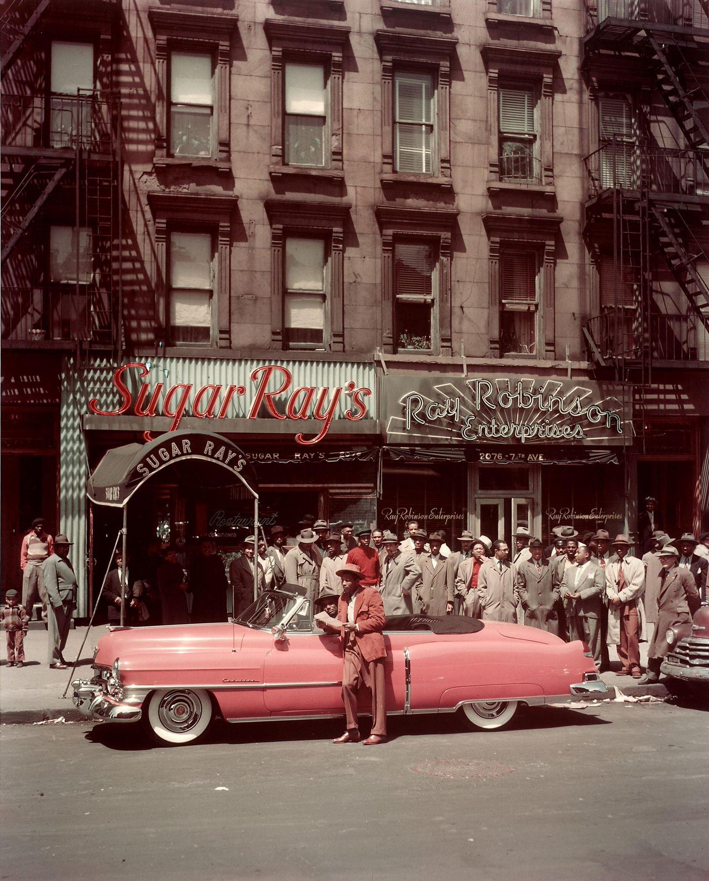 Boxer Sugar Ray Robinson Leaning On His 1950 Pink Cadillac Convertible In Harlem, Manhattan, 1950