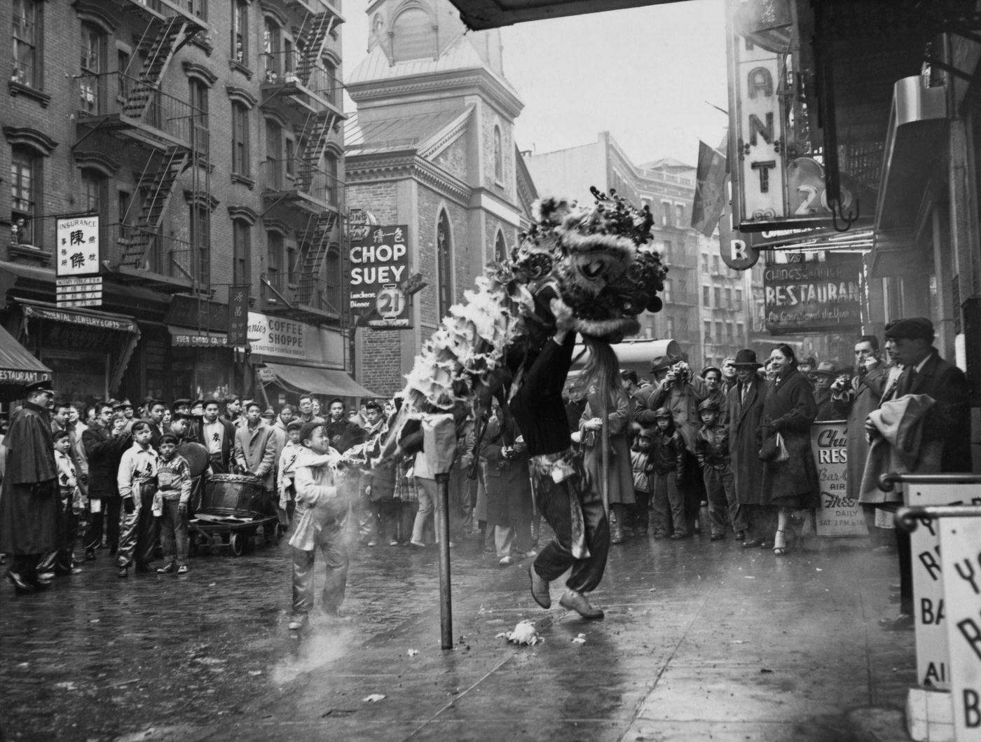 Dragon Dance During Chinese New Year Celebrations On Mott Street In Chinatown, Manhattan, 1957