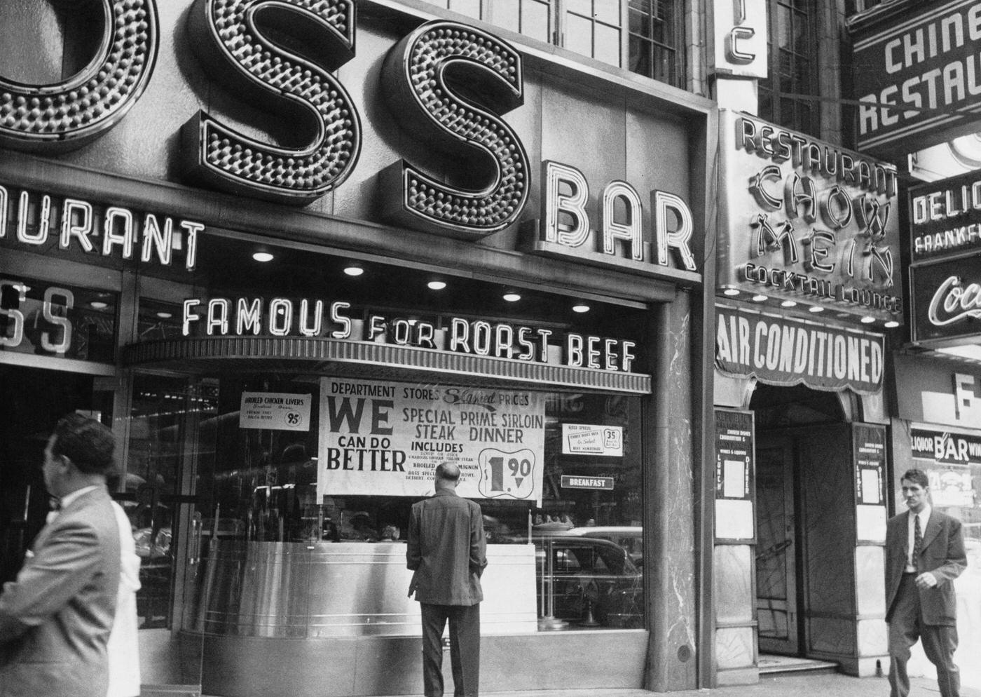 Price War In New York City: Ross Restaurant Displaying Signs Announcing The &Amp;Quot;Price War&Amp;Quot; And Sales On Broadway, Manhattan, 1951.