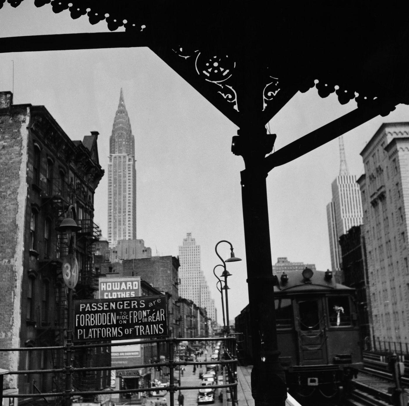 Midtown Manhattan, Nyc: Sign Reads 'Passengers Are Forbidden To Ride On Platforms Of Trains' Near Chrysler Building, Manhattan, 1950