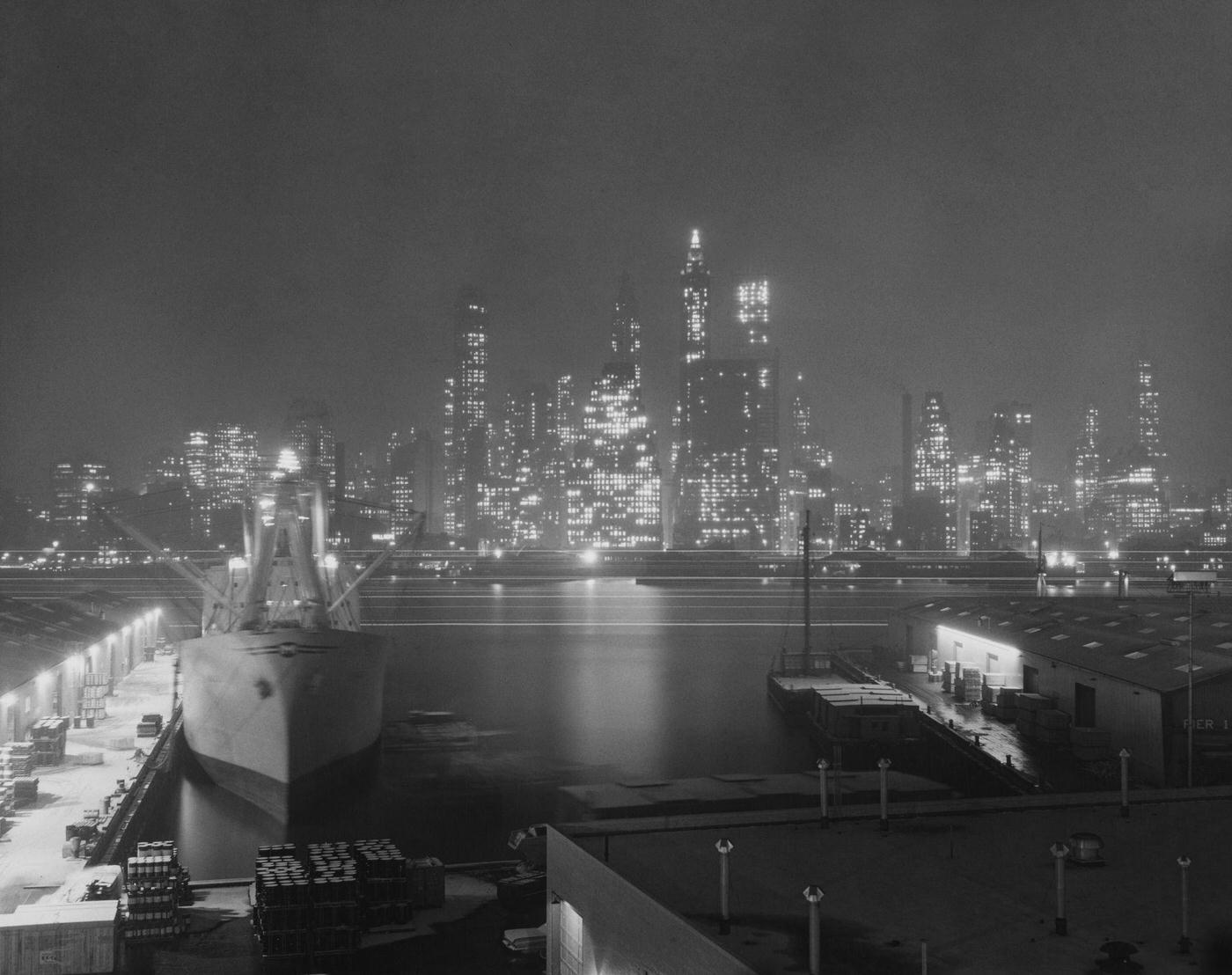 Manhattan At Night: View From A Dock Across The River, Manhattan, 1950