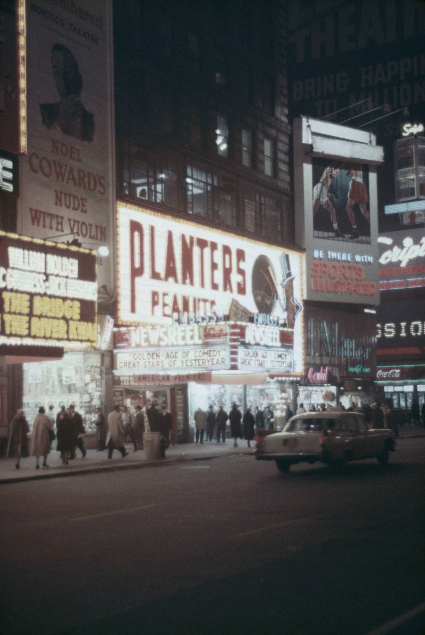 Various Advertisements And Planters Peanuts Illuminated At Times Square, Manhattan, 1957.