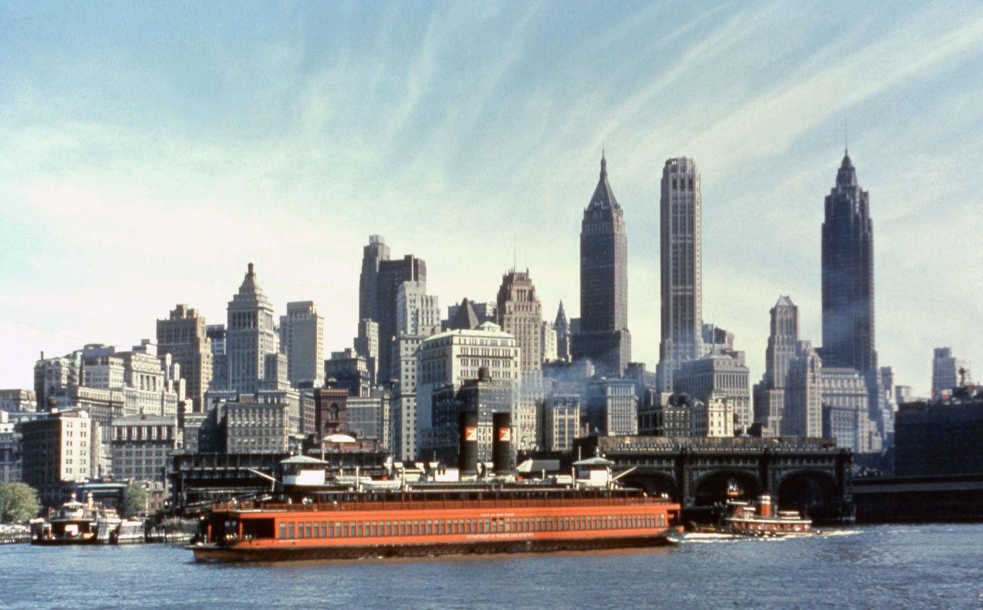 Ferry Maneuvers The East River In Front Of The Manhattan Skyline, Manhattan, 1957.