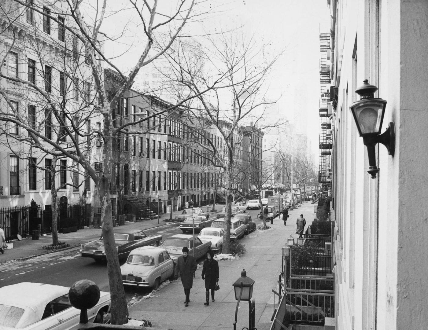 Pedestrians Walk Beside Cars Parked Along East 61St Street In Manhattan, 1968.
