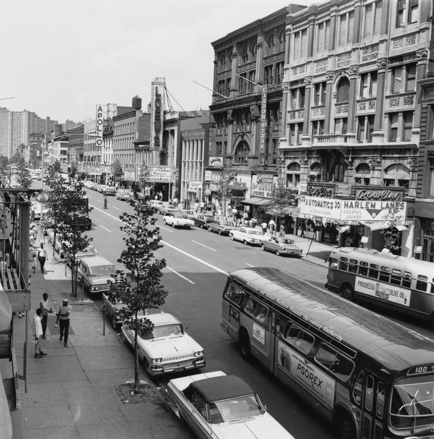 Cars Parked And Buses Pass 125 Street In Harlem, Manhattan, 1964