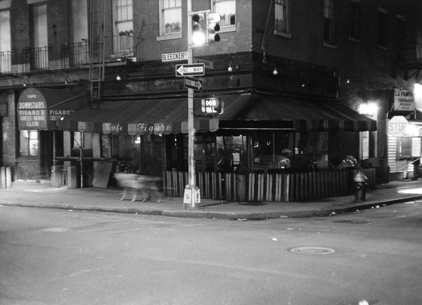 Nighttime View Of The Closed Cafe Figaro At The Intersection Of Bleeker And Macdougal Streets In Greenwich Village, Manhattan, 1969