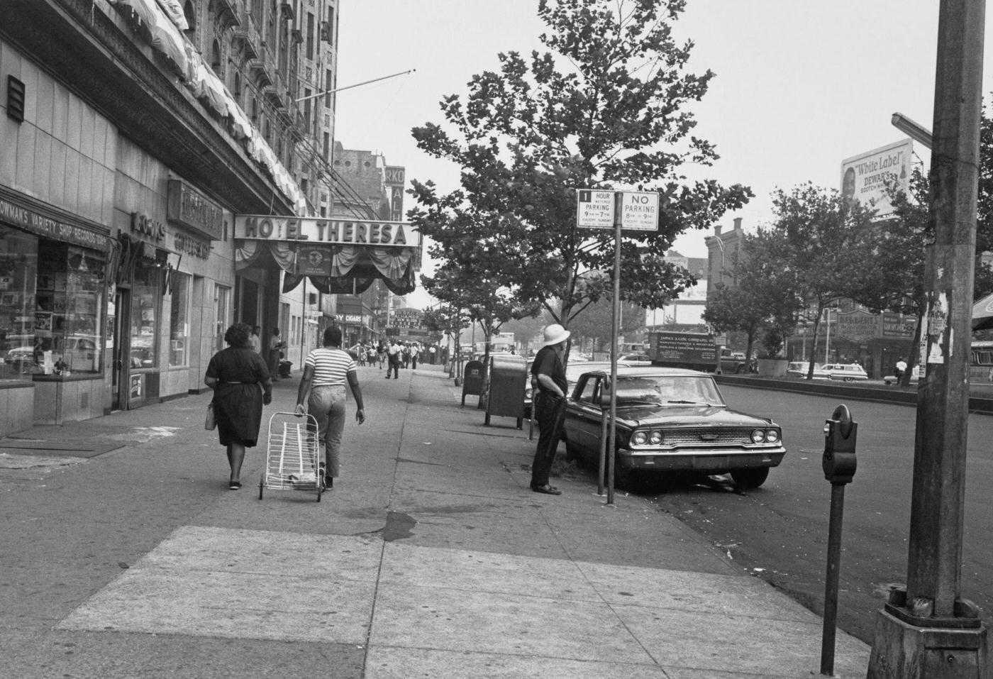 Pedestrians Outside The Hotel Theresa In Harlem, Manhattan, 1964