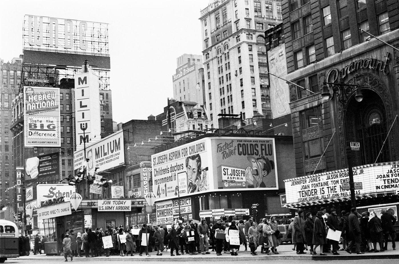 Anti-Nuclear Protestors Marching Past The Paramount Theater In Times Square, Manhattan, 1962